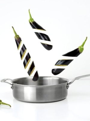 Three Sliced Eggplants and Gray Stainless Steel Non-stick Pan